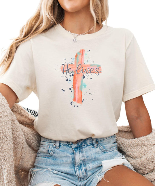 He Lives Christian Easter T-Shirt – Watercolor Cross Faith Graphic Tee for Women – Religious Spring Outfit