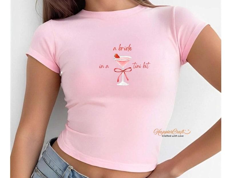A Bride In A Tini Bit Bachelorette Baby Tee, Y2k Trending Bachelorette Party Baby Tee, Bride To Be Shirt Bridal Party...