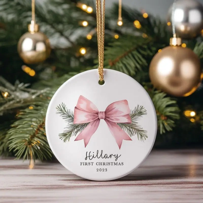 Baby Girl's First Christmas Ornament Personalized 2024 | Pink Bow T-Shirts, Hoodie, Sweatshirt | WearSparks.com