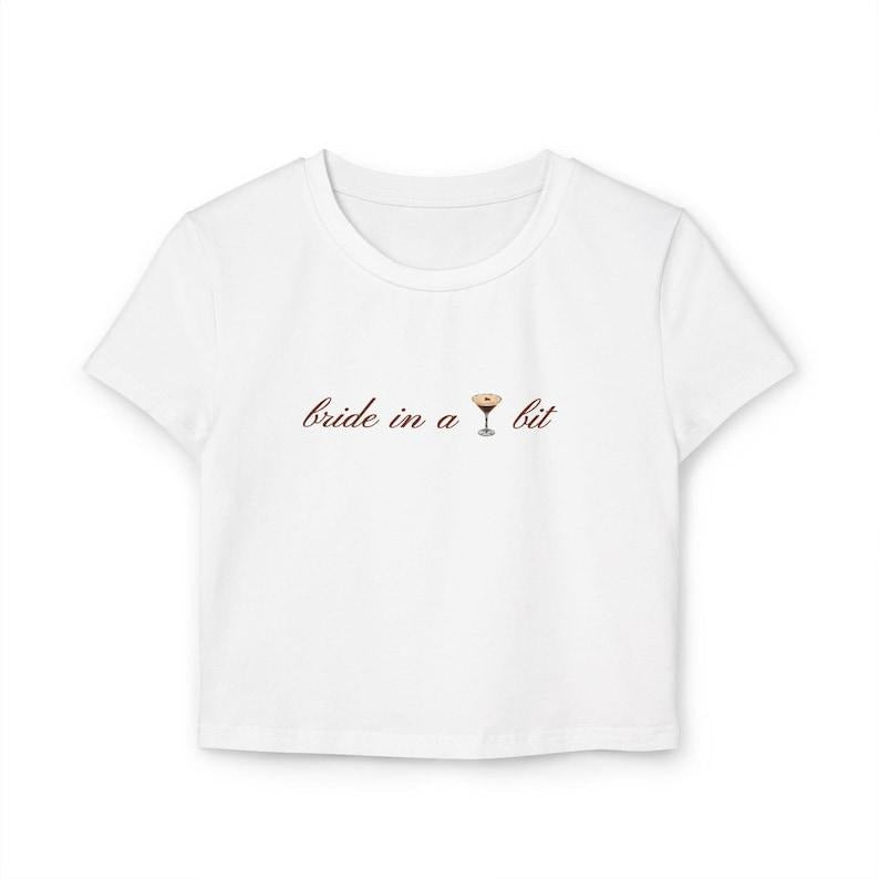 Bride in a Tini Bit Women's Baby Tee (Espresso Martini) Hoodie, Sweatshirt | WearSparks.com