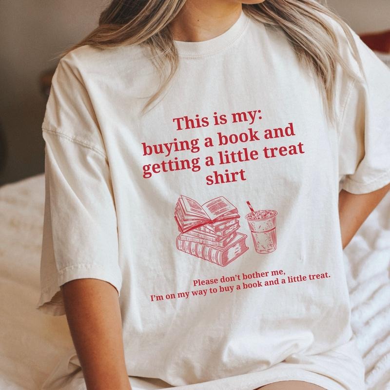 Buying a book and getting a little treat shirt. Bookish shirt. Retro book shirt. Book lover shirt. Funny book T-shirt....