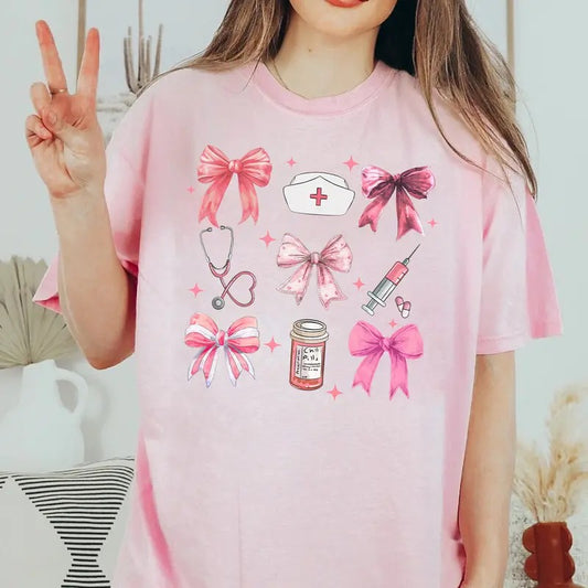 Coquette Bow Nurse T-shirt, Cute Nurse Shirt, Nurse Graduation Gift, RN Tee, In October We Wear Pink Shirt Comfort Fabric...