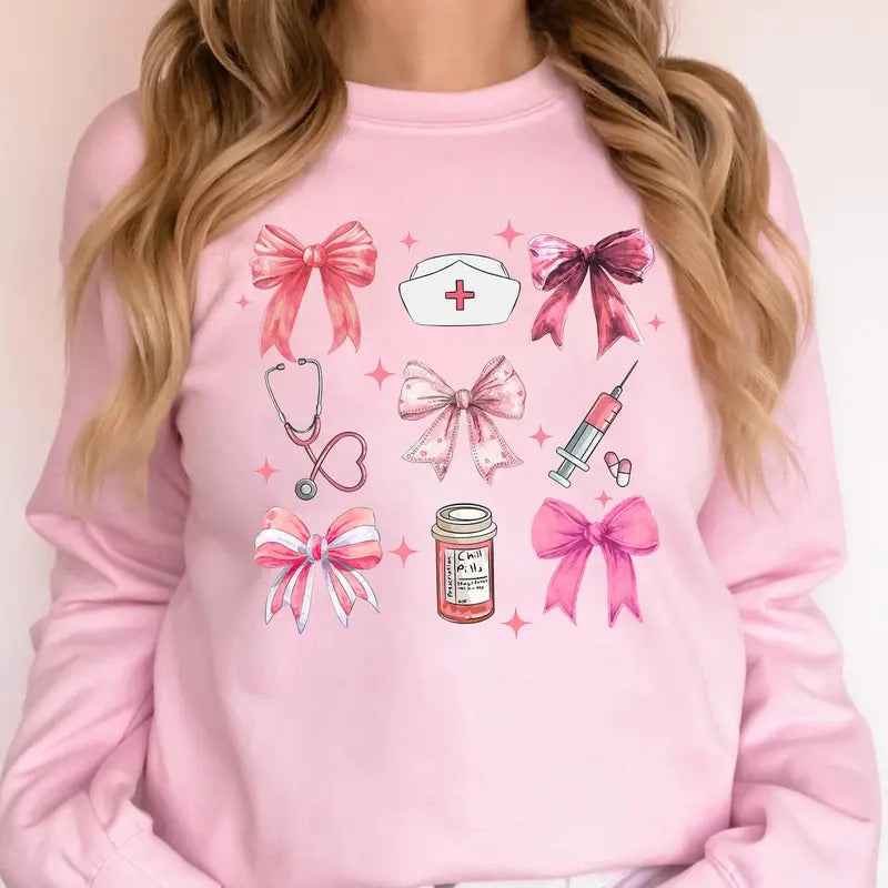 Coquette Nurse Sweatshirt, Pink Bow Nurse Sweatshirt, Girly Nurse Sweater, Nurse Gift Casual Comfort T-Shirts, Hoodie
