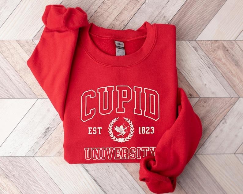 Cupid University Sweatshirt, Cute Valentine's Day Shirt, Funny College Sweatshirt, Love Crewneck Sweatshirt, Cupid Hoodie...