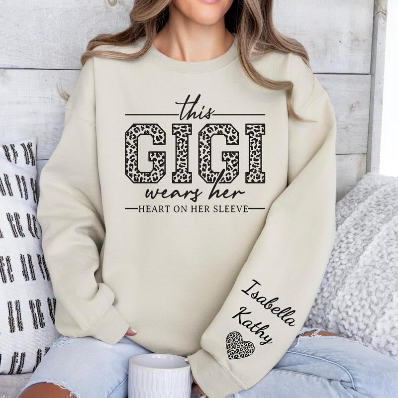 Custom Gigi Sweatshirt, Custom Grandma Gift, This Gigi Wears Her Heart On Her Sleeve Sweater, With Kids Name On Sleeve,...