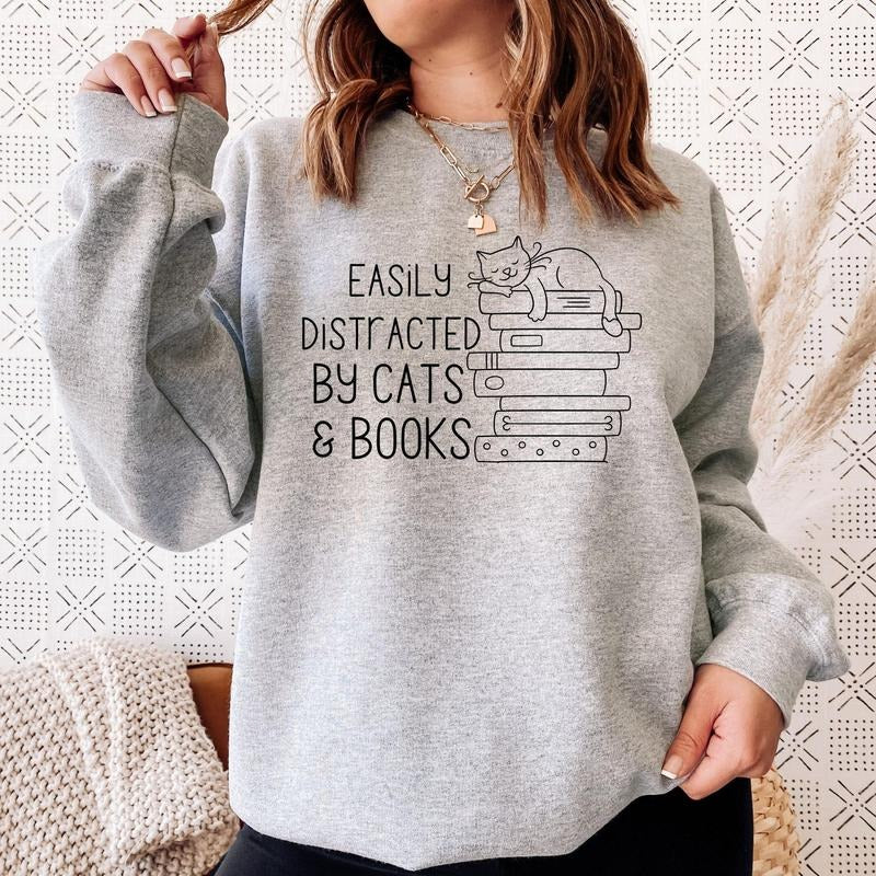 Easily Distracted By Cats and Books Sweatshirt, Bookish Gift, Funny Sayings Sweatshirt, Cat Sweatshirt, Cat Lover Gift,...