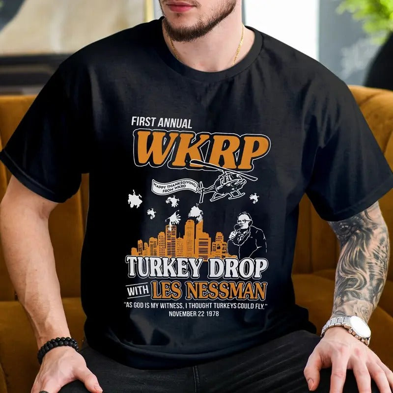 First Annual Wkrp Turkey Drop Les Nessman Shirt, Funny Thanksgiving Movie Shirt, Turkey Meme, Unisex Short Sleeve Tee...