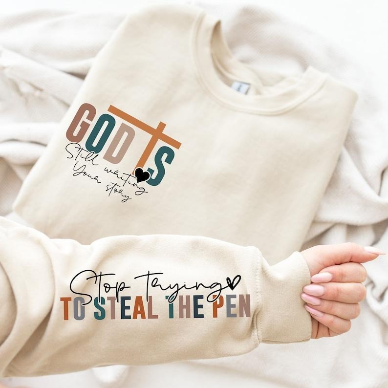 God is Still Writing Your Story T-Shirt, Inspirational Church Sweater, Christian Sweatshirt, Bible Verse  T-shirt,...