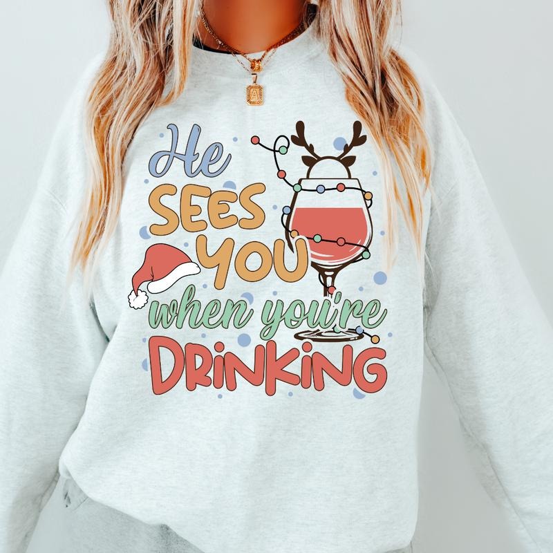 HE SEES YOU WHEN YOUR DRINKING CREWNECK (Crewneck Sweatshirt, Unisex Fit, Causal Sweatshirt for Christmas, Christmas...