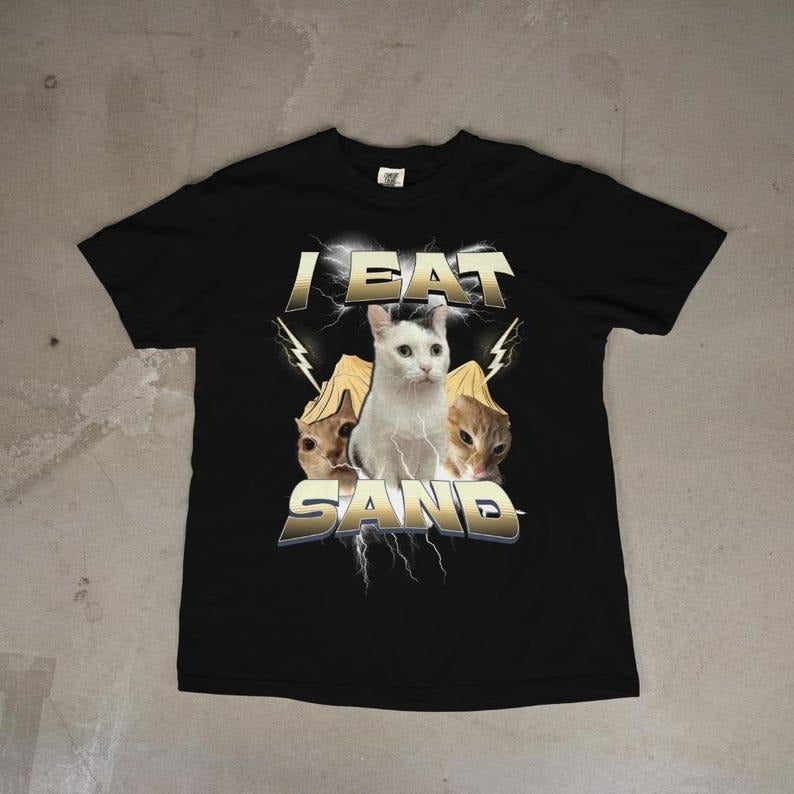 I EAT SAND Silly Cat Meme T-Shirt, Funny Graphic Tee for Cat Lovers & Pet Owners, Cute Humor Gift Idea, Unhinged Cringe...