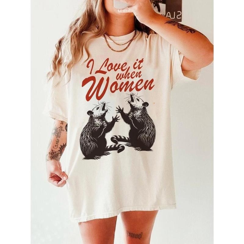 I love it when women shirt | funny lesbian shirt | pan pride | bi clothing | possum shirt | queer punk | sapphic shirt |...