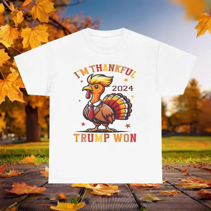 I'm Thankful Trump Won 2024 Thanksgiving Tshirt, fun holiday-themed design, Trump-inspired turkey. Limited stock! Hoodie,...