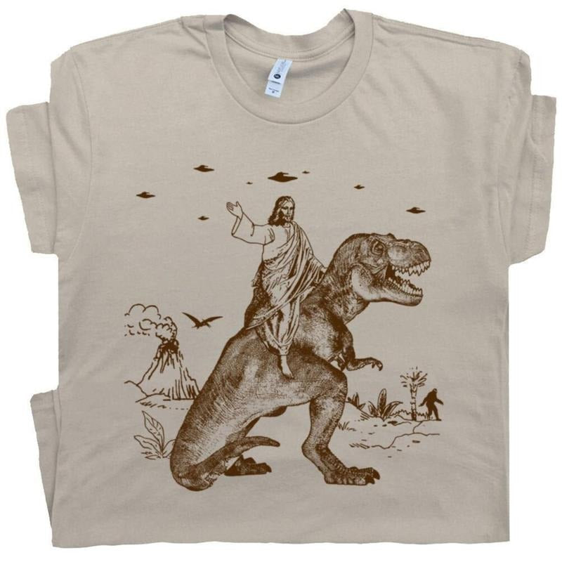 Jesus Riding Dinosaur T Shirt UFO T Shirt Funny T Shirts Cotton Menswear Top Polyester Hoodie, Sweatshirt | WearSparks.com