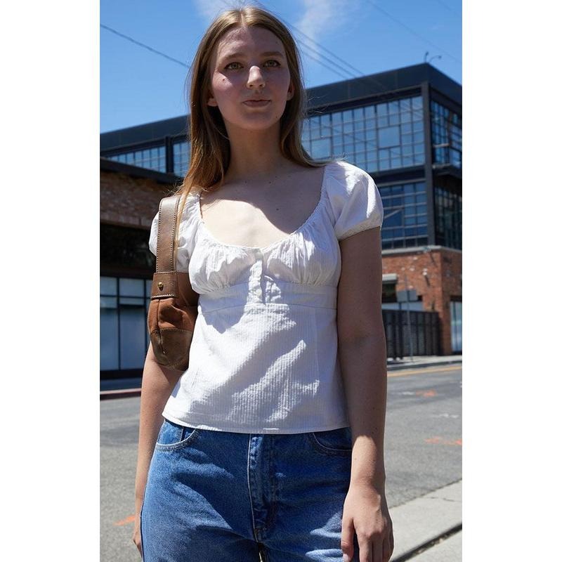 John Galt Women's White Short Sleeve Babydoll Top T-Shirts, Hoodie, Sweatshirt | WearSparks.com
