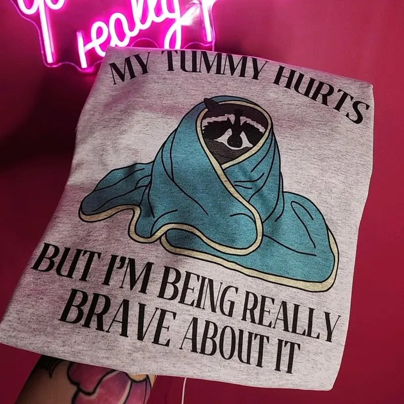 My tummy hurts but I'm being really brave about it Graphic Tee Hoodie, Sweatshirt | WearSparks.com