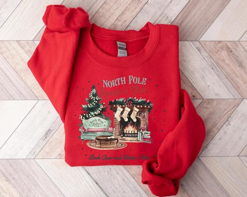 North Pole Reader's Club Hoodie, Christmas Book Lover Sweatshirt, Cozy Holiday Design, Winter Reader Apparel, Christmas...