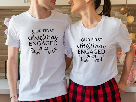 Our First Christmas Engaged 2023 Shirt, Matching New Engaged Couple Xmas T-Shirt, Engagement Gift Holiday Tee, Fiancé And...