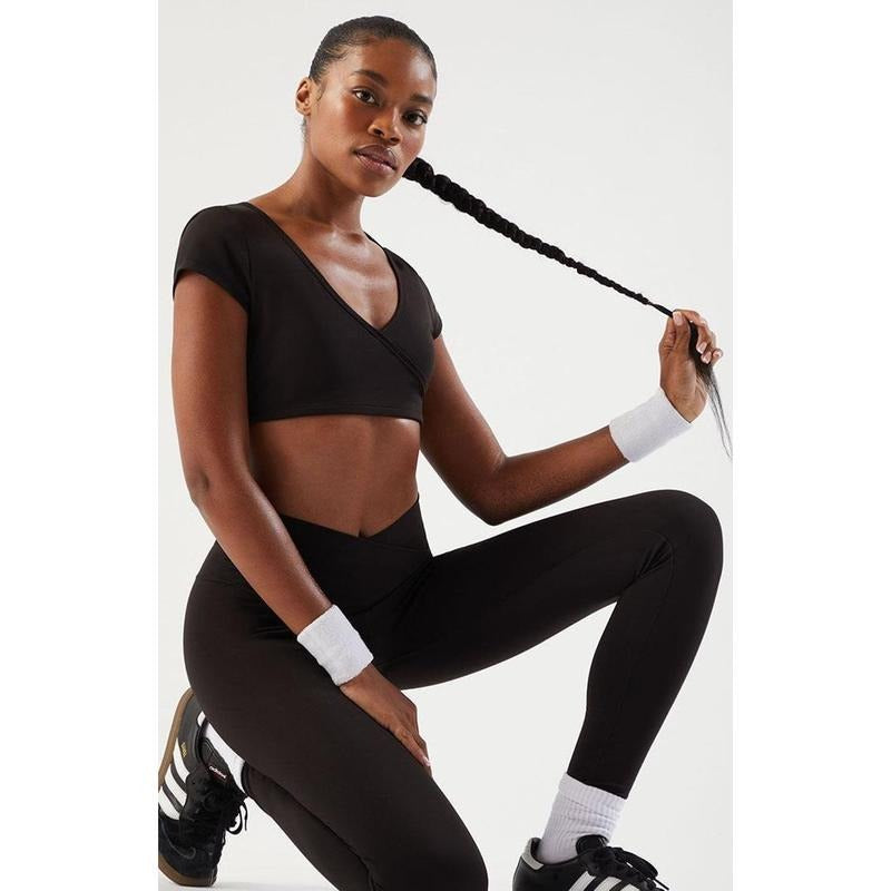 PAC 1980 Women's PAC WHISPER Black Active Anya Surplice Bralette Top T-Shirts, Hoodie, Sweatshirt | WearSparks.com