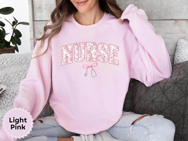Pink Nurse Toile Bow Sweatshirt, Stethoscope Coquette Soft Girl Gift, Registered Nurse Graduation Crewneck, Healthcare...