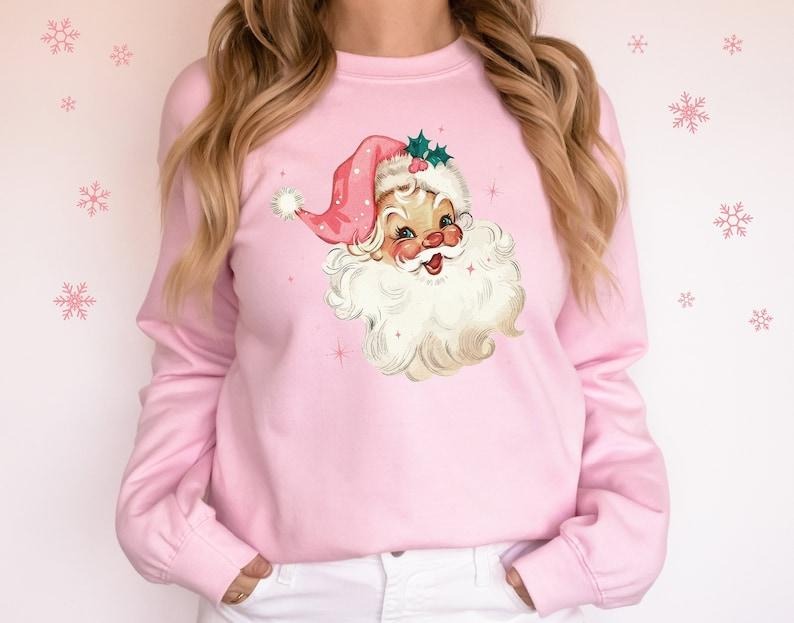 Pink Santa Christmas Sweatshirt Gift for Woman Christmas Christmas,Holiday Hoodie and Sweater; T-shirt Cotton Polyester...
