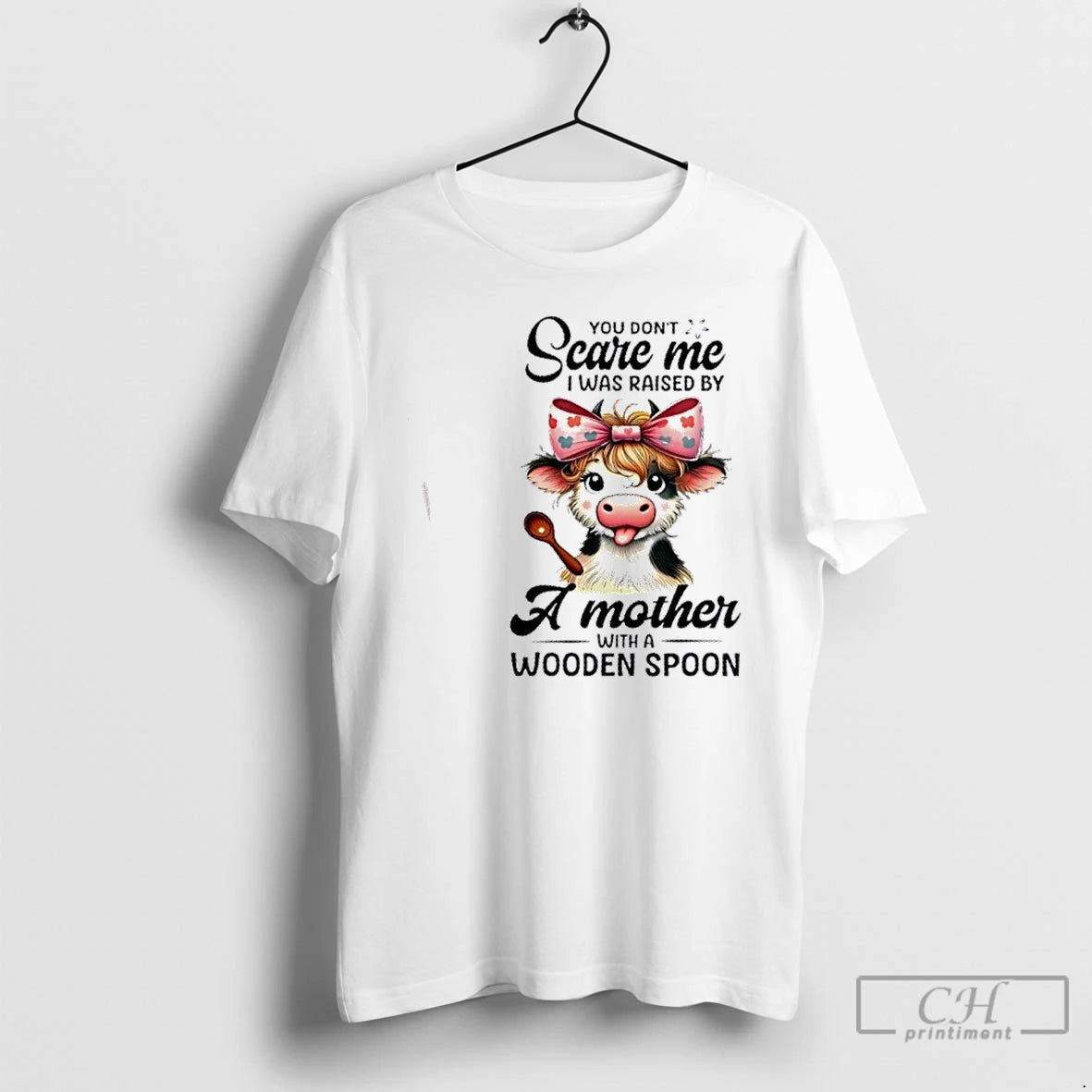 Premium Cow You Dont Scare Me I Was Raised By A Mother With A Wooden T-Shirts, Hoodie, Sweatshirt | WearSparks.com