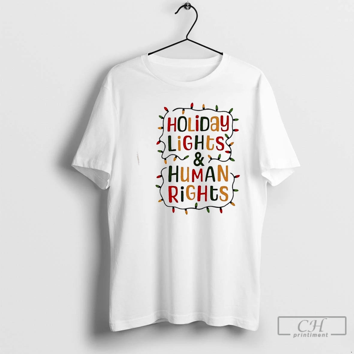 Premium Holiday Lights And Human Rights Christmas Gift T-Shirts, Hoodie, Sweatshirt | WearSparks.com