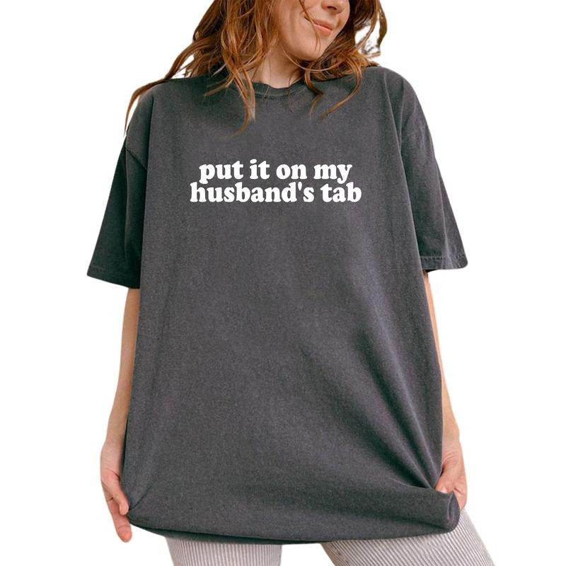 Put It On My Husband's Tab Shirt, Funny Wife Graphic Printed Tee, Sarcastic Wifey Unhinged Shirt, Adult Humor Comfy...