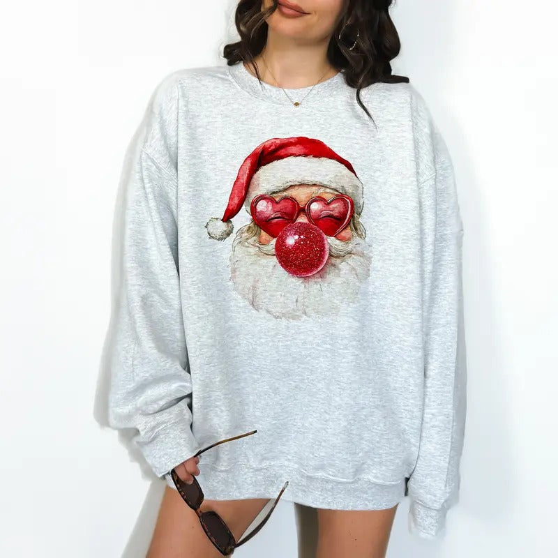 Red Bubblegum Santa - Unisex Crewneck Sweatshirt - Print is Sublimation, Christmas Crewneck, Gift Idea, Relaxed Fit,...