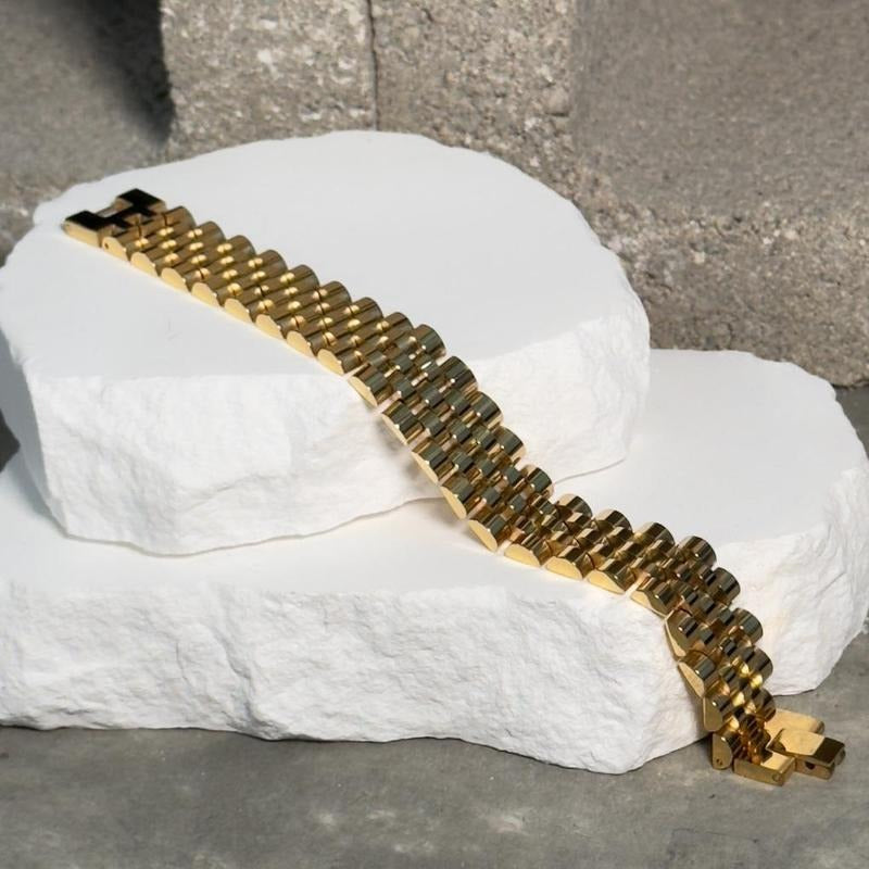 Roly Statement Bracelet - Gold-Toned Design on White Surface Product Image T-Shirts, Hoodie, Sweatshirt | WearSparks.com