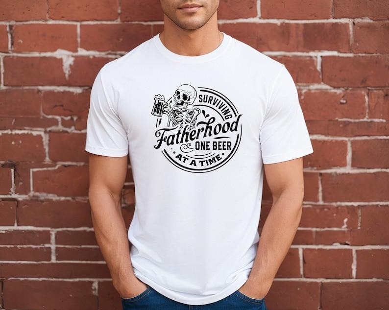 Surviving Fatherhood One Beer At A Time Shirt, Father's Day Gift, Funny Dad Shirt, Gift For Dad, Beer Lover Dad Shirt...