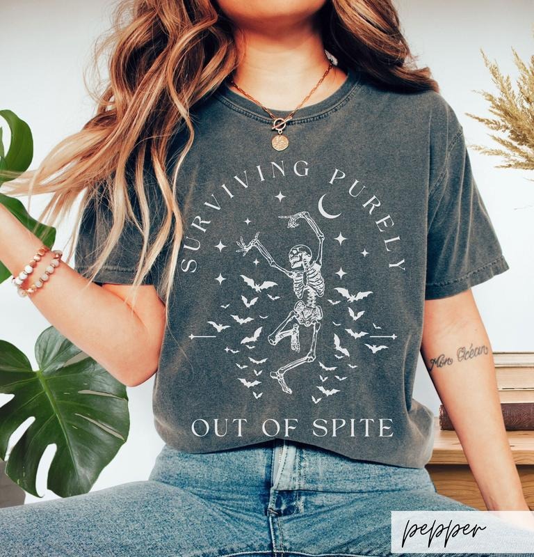 Surviving Purely out of Spite T-Shirt, Funny Goth Celestial Skeleton and Bats Shirt, Bat Lover Gothic Boho Garment Dyed...