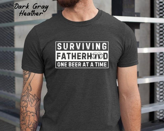 Surviving Fatherhood One beer at a time Dad Shirt/T-shirt/Hoodie/Sweater, Funny Dad Shirt, New Dad T shirt, Father's Day...