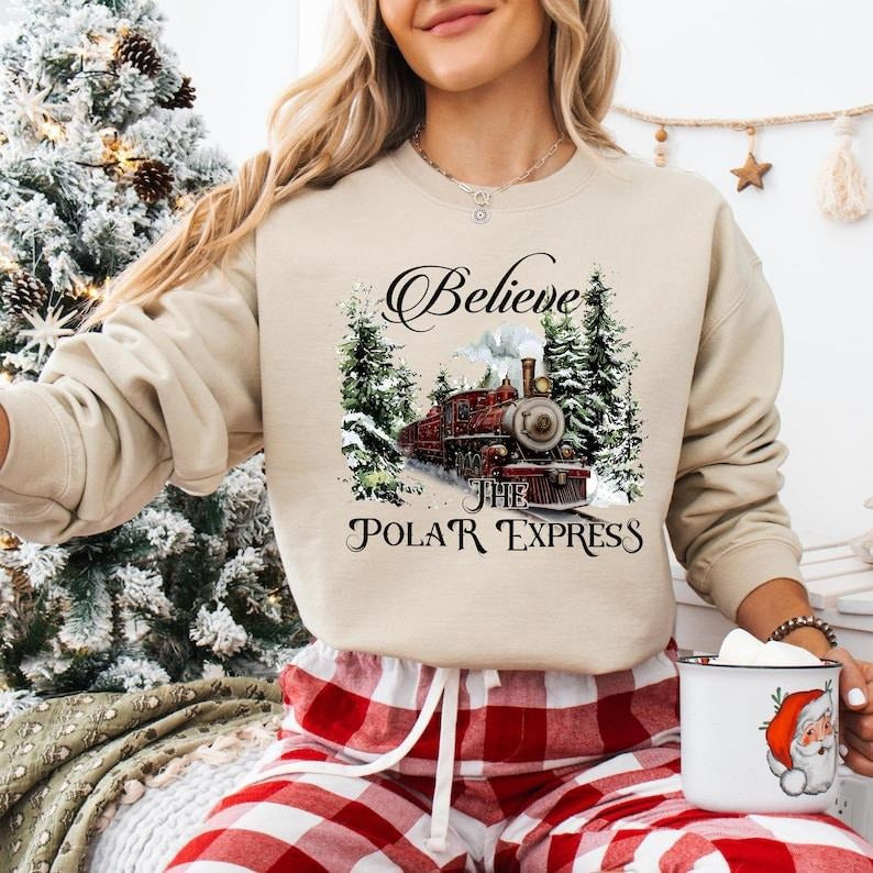 The Polar Express Christmas Sweatshirt, North Pole Christmas T-shirt, Believe Christmas Tee, All Aboard Admit One Hoodie,...