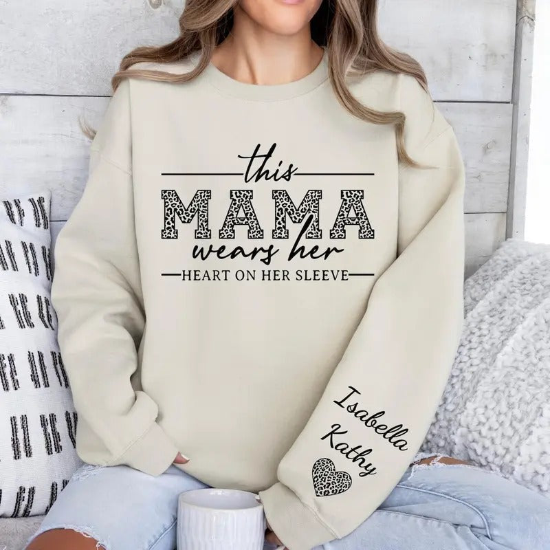 This Mama Wears Her Heart On Her Sleeve Sweatshirt for Mothers Day, Custom Mama Sweatshirt with kids Name on Sleeve,...