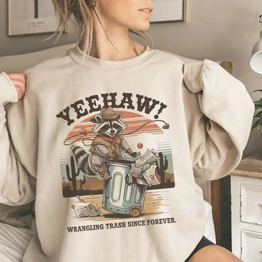 Yeehaw Wrangling Trash Since Forever Feral Racoon Crewneck Sweatshirt, Racoon Cowgirl Country Side Shirt Hoodie