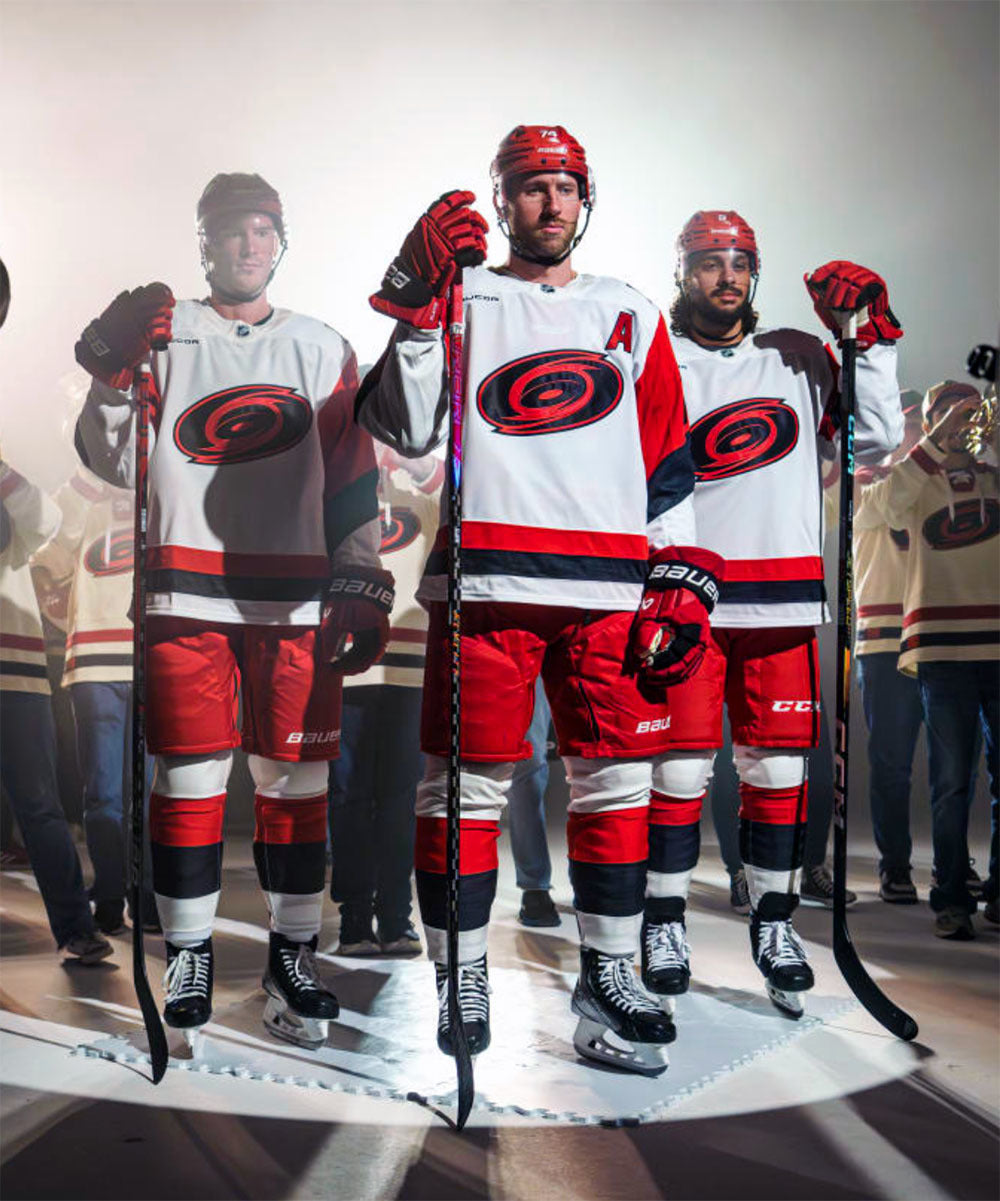 carolina-hurricanes-new-road-white-uniforms-2025-26-sportslogosnet-2