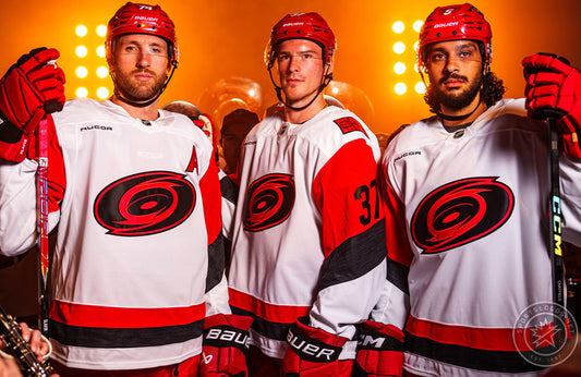 carolina-hurricanes-new-road-white-uniforms-2025-26-sportslogosnet